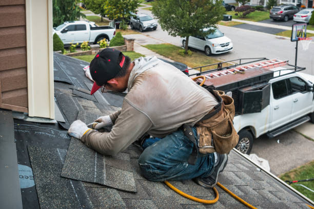 Professional Roofing technician working in Gerton, NC